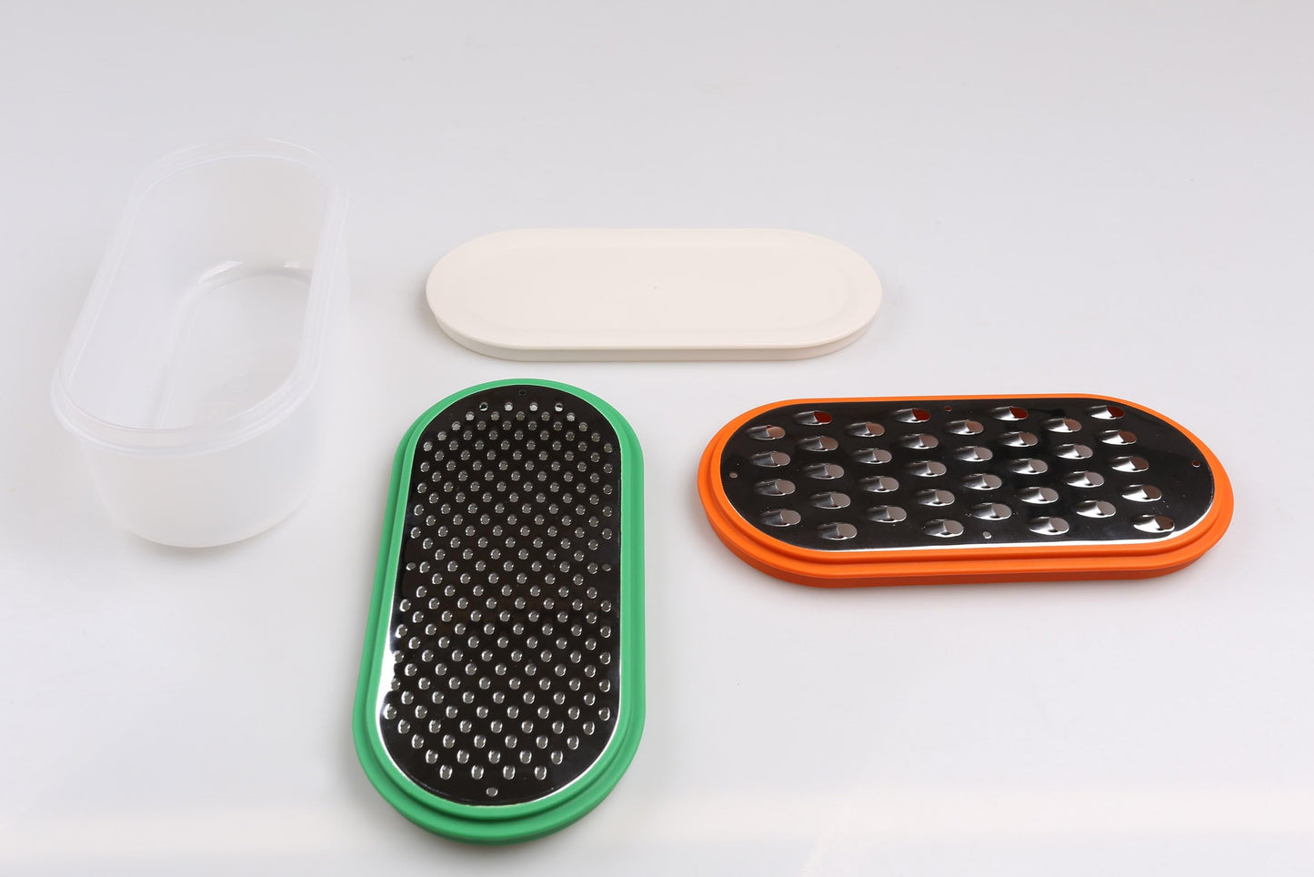 UPPFYLLD Grattugia colorata con contenitore, set di 4 pezzi