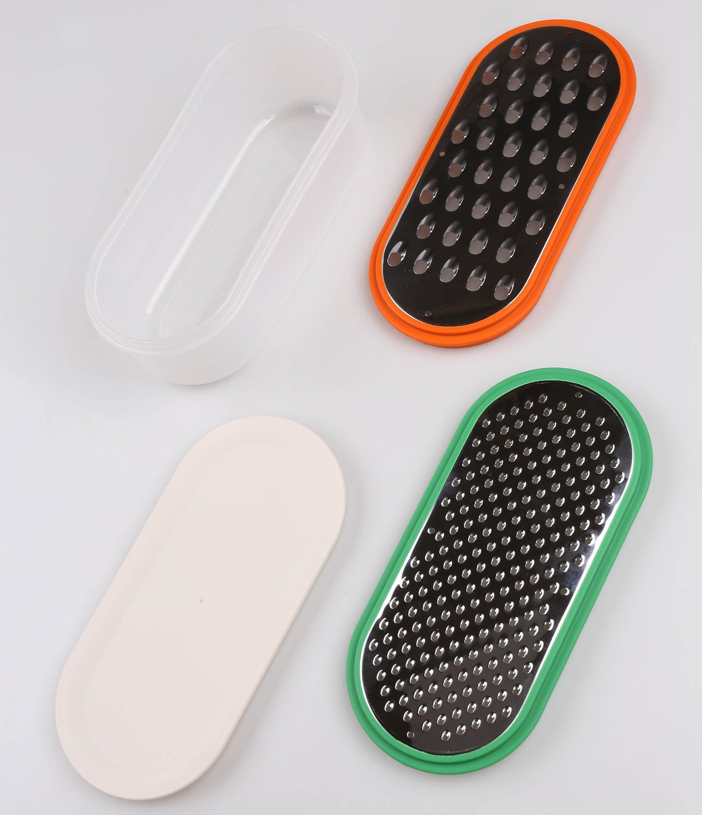 UPPFYLLD Grattugia colorata con contenitore, set di 4 pezzi