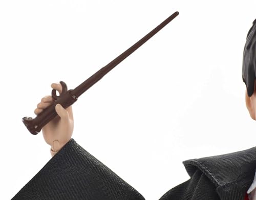 Harry Potter FYM50 - Bambola da collezione con uniforme di Hogwarts, vestaglia e parete di Grifondoro